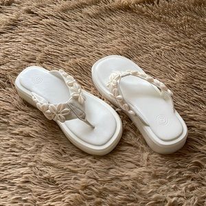 White seashell sandals